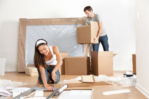 Furniture and boxes prepared for a man with van removal service