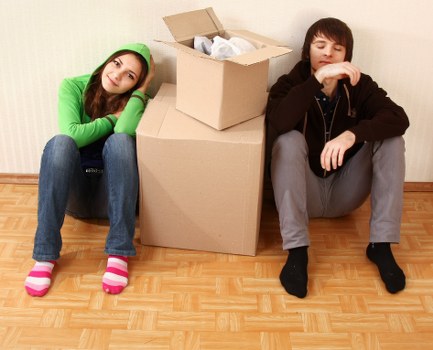 Professional house removals service in Eastbarnet with packed boxes and moving van