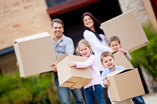 Professional movers handling a flat move with stairs and access care